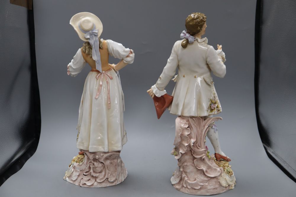 A pair of Rudolstadt Volkstedt figures of a lady and gentleman, height 40cm